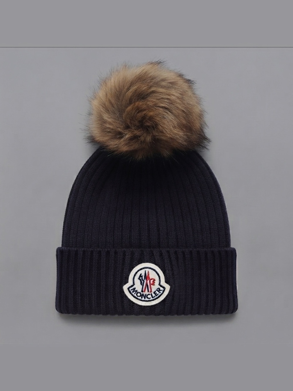 Moncler Black Ribbed Beanie with Brown Faux Fur Pom